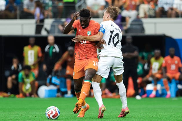 Ibrahim Sangare of Ivory Coast (L) runs with the ball under pressure from Martin Odegaard of Norway (R) during a FIFA Men’s World Cup 2026 round of 32 football match between Ivory Coast and Norway at Dallas Stadium, in Arlington on June 30th 2026 (Photo by Leo Barrilari SPP)  Copyright: xLeoxBarrilari SPPx Sportspressphoto_SPR181128