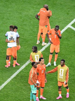 (260701) -- DALLAS, July 1, 2026 -- Players of Cote d Ivoir react after the round of 32 match between Cote d Ivoire and Norway at the 2026 FIFA World Cup, WM, Weltmeisterschaft, Fussball at Dallas Stadium in Dallas, the United States, June 30, 2026. ) (SP)U.S.-DALLAS-FOOTBALL-FIFA WORLD CUP-ROUND OF 32-CIV VS NOR WuxXiaoling 