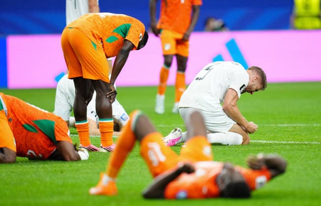 (260701) -- DALLAS, July 1, 2026 -- Kristoffer Ajer (R) of Norway celebrates after the round of 32 match between Cote d Ivoire and Norway at the 2026 FIFA World Cup, WM, Weltmeisterschaft, Fussball at Dallas Stadium in Dallas, the United States, June 30, 2026. ) (SP)U.S.-DALLAS-FOOTBALL-FIFA WORLD CUP-ROUND OF 32-CIV VS NOR JiaxHaocheng 