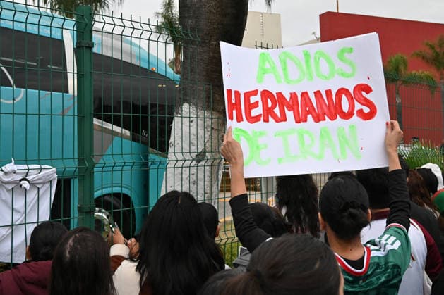 Iranian national team, Nationalteam FIFA World Cup, WM, Weltmeisterschaft, Fussball 2026 leave Tijuana, Mexico camp back home to Iran TIJUANA, MEXICO - JUNE 30: A fan carries a sign that reads ‘Adios Hermanos De Iran’ Goodbye Iranian Brothers as they wait for Iran s national team players to leave the Marriott Hotel at their Tijuana base camp to the airport ahead of the team’s departure following its elimination from the 2026 World Cup football tournament in Tijuana, Mexico on Tuesday, June 30, 2026. Carlos A. Moreno Anadolu Tijuana Mexico. Editorial use only. Please get in touch for any other usage.  Copyright: x2026xAnadoluxCarlosxA.xMorenox