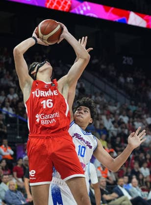 Turkiye v Puerto Rico - FIBA U17, U 17 Basketball World Cup ISTANBUL, TURKIYE - JUNE 30: Atahan Agacdelen of Turkiye competes with Ivaniel Lopez Arache (10) of Puerto Rico during the FIBA U17 Basketball World Cup group phase match between Puerto Rico and Turkiye at the Basketball Development Center in Istanbul, Turkiye on June 30, 2026. Esra Bilgin Anadolu Istanbul Turkey. Editorial use only. Please get in touch for any other usage.  Copyright: x2026xAnadoluxEsraxBilginx