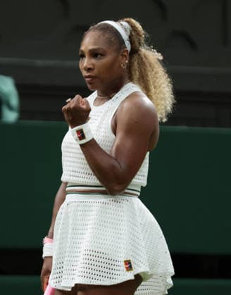 American Serena Williams reacts to a point in her match against Australia s Maya Joint on day two of the 2026 Wimbledon Championships in London on Tuesday, June 30, 2026. Joint won the match 6-3,6-7,6-3.  LON2026063069 HUGOxPHILPOTT