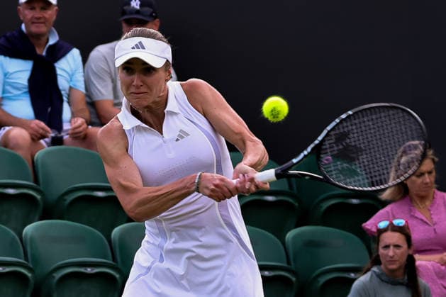 (260701) -- LONDON, July 1, 2026 -- Elina Svitolina of Ukraine returns the ball during the women s singles first round match against Daria Snigur of Ukraine at Wimbledon tennis Championship in London, Britain, on June 30, 2026. (Photo by Xinhua) (SP)BRITAIN-LONDON-TENNIS-WIMBLEDON-WOMEN S SINGLES DinendraxHaria 