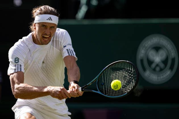 (260701) -- LONDON, July 1, 2026 -- Alexander Zverev of Germany returns the ball during the men s singles first round match against Alexander Blockx of Belgium at Wimbledon tennis Championship in London, Britain, on June 30, 2026. (Photo by Xinhua) (SP)BRITAIN-LONDON-TENNIS-WIMBLEDON-MEN S SINGLES StephenxChung 