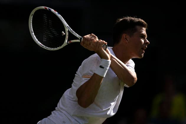 (260701) -- LONDON, July 1, 2026 -- Alexander Blockx of Belgium competes during the men s singles first round match against Alexander Zverev of Germany at Wimbledon tennis Championship in London, Britain, on June 30, 2026. (Photo by Xinhua) (SP)BRITAIN-LONDON-TENNIS-WIMBLEDON-MEN S SINGLES StephenxChung 