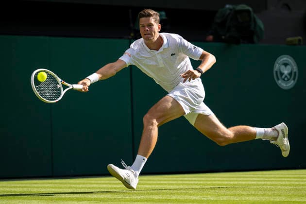 (260701) -- LONDON, July 1, 2026 -- Alexander Blockx of Belgium returns the ball during the men s singles first round match against Alexander Zverev of Germany at Wimbledon tennis Championship in London, Britain, on June 30, 2026. (Photo by Xinhua) (SP)BRITAIN-LONDON-TENNIS-WIMBLEDON-MEN S SINGLES StephenxChung 