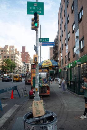 June 30, 2026, New York City, New York, USA: The New York City Department of Transportation hung orange and blue signs with the names and jersey numbers of each New York Knick basketball player at intersections along Sixth and Seventh Avenues in New York City. Knicks player Mitchell Robinson honored at the intersection of West 23rd street and Seventh Avenue. New York City USA - ZUMAt442 20260630_znp_t442_016 Copyright: xBillyxTompkinsx