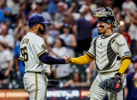 Milwaukee Brewers closing pitcher Grant Anderson (L) and Milwaukee Brewers catcher William Contreras (R) celebrate after the final out in the ninth inning of the MLB, Baseball Herren, USA game between the Cincinnati Reds and the Milwaukee Brewers at American Family Field in Milwaukee, Wisconsin on Tuesday, June 30, 2026. The Brewers defeated the Reds 7-2.  MIL20260630838 TANNENxMAURY