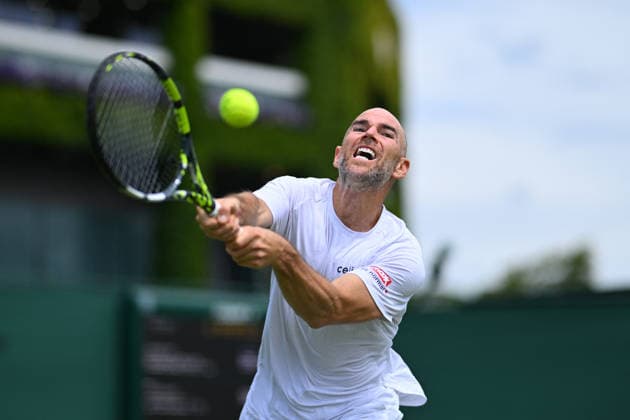 2026 Wimbledon - Adrian Mannarino Adrian Mannarino (FRA) during his first round match at the 2025 Wimbledon Tennis Championships at the AELTC in London, GREAT BRITAIN, on JuNE 30, 2026. Photo by Corinne Dubreuil ABACAPRESS.COM London  Copyright: xDubreuilxCorinne ABACAx