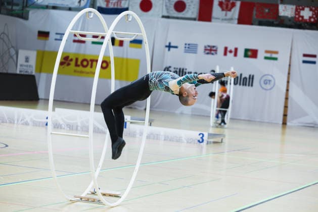 Wheel Gymnastics World Championships 2026 Rhönrad Weltmeisterschaft 2026. Deutschland, Göttingen am 01. Juli 2026: Tag eins der Weltmeisterschaft in Rhönrad mit über 250 Athletinnen und Athleten aus 17 Nationen. Im Bild: Der niederländische Rhönrad Turner GabriÃ«l Lomans beim Geradeturnen Disziplin (Straight-line). *** 2026 World Championships in Wheel Gymnastics, 2026 Rhönrad World Championships, Germany, Göttingen on July 1, 2026—Day one of the Rhönrad World Championships with over 250 athletes from 17 nations. Pictured: Dutch Rhönrad gymnast Gabriël Lomans performing in the Straight Line discipline.