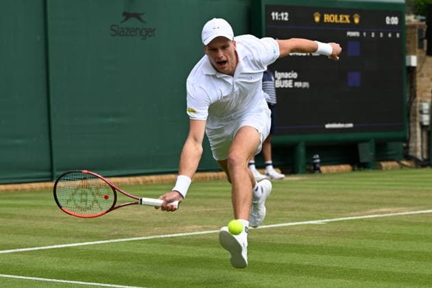 Wimbledon Tennis Championships 2026 - Day 3 LONDON, UNITED KINGDOM - July 01: Jenson Brooksby of the United States plays against Ignacio Buse of Peru in the Mens singles second round match against during day three of The Wimbledon Tennis Championships at All England Lawn Tennis and Croquet Club on July 01, 2026 in London, United Kingdom Ray Tang Anadolu London United Kingdom. Editorial use only. Please get in touch for any other usage.  Copyright: x2026xAnadoluxRayxTangx