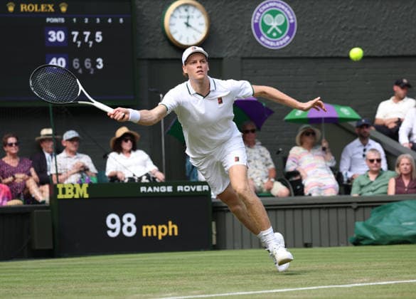 Italian Jannik Sinner plays a forehand in his match against Portugal s Nuno Borges on day three of the 2026 Wimbledon Championships in London on Wednesday, June 01, 2026. Sinner won the match 7-6,7-6,6-4.  LON2026070143 HUGOxPHILPOTT