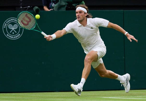 2026 Wimbledon, July 01, Day 3 LONDON, - JULY 1: Stefanos Tsitsipas of Greece plays a shot against Novak Djokovic of Serbia on Centre Court during the 2026 Wimbledon, July 01, Day 3 at The all England club, Wimbledon on July 1, 2026 in London,GBR. London The all England club, Wimbledon GBR Copyright: xPeterxvanxdenxBerg ISIxPhotosx 9441