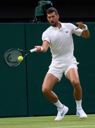2026 Wimbledon, July 01, Day 3 LONDON, - JULY 1: Novak Djokovic of Serbia plays a shot against Stefanos Tsitsipas of Greece on Centre Court during the 2026 Wimbledon, July 01, Day 3 at The all England club, Wimbledon on July 1, 2026 in London,GBR. London The all England club, Wimbledon GBR Copyright: xPeterxvanxdenxBerg ISIxPhotosx 9441