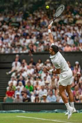 RECORD DATE NOT STATED 1st July 2026; All England Lawn Tennis and Croquet Club, London, England; Wimbledon Tennis Tournament, Day Three; Novak Djokovic (SRB) serves in his second round match against Stefanos Tsitsipas (GRE) GodfreyxPitt