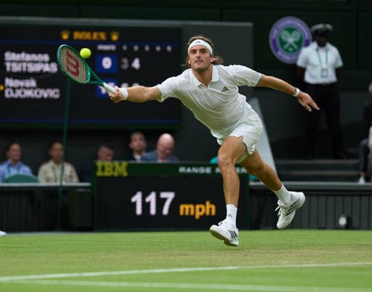2026 Wimbledon, July 01, Day 3 LONDON, - JULY 1: Stefanos Tsitsipas of Greece plays a shot against Novak Djokovic of Serbia on Centre Court during the 2026 Wimbledon, July 01, Day 3 at The all England club, Wimbledon on July 1, 2026 in London,GBR. London The all England club, Wimbledon GBR Copyright: xPeterxvanxdenxBerg ISIxPhotosx 9441