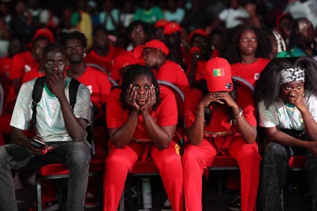 Senegal fans gather to watch World Cup in Dakar DAKAR, SENEGAL- JULY 02: Fans of Senegal upset after the team s elimination from the 2026 FIFA World Cup, WM, Weltmeisterschaft, Fussball Round of 32 as thousands of fans gathered at Place de la Nation Square to watch the match on a giant screen, holding Senegal flags and wearing national team, Nationalteam jerseys in Dakar, Senegal, on July 02, 2026. Cem Ozdel Anadolu Dakar Senegal. Editorial use only. Please get in touch for any other usage.  Copyright: x2026xAnadoluxCemxOzdelx