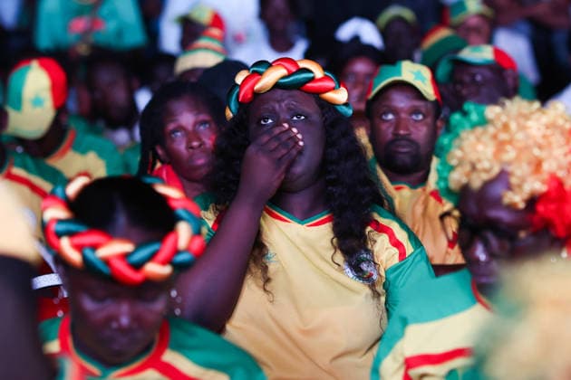 Senegal fans gather to watch World Cup in Dakar DAKAR, SENEGAL- JULY 02: A fan of Senegal upsets after the team s elimination from the 2026 FIFA World Cup, WM, Weltmeisterschaft, Fussball Round of 32 as thousands of fans gathered at Place de la Nation Square to watch the match on a giant screen, holding Senegal flags and wearing national team, Nationalteam jerseys in Dakar, Senegal, on July 02, 2026. Cem Ozdel Anadolu Dakar Senegal. Editorial use only. Please get in touch for any other usage.  Copyright: x2026xAnadoluxCemxOzdelx