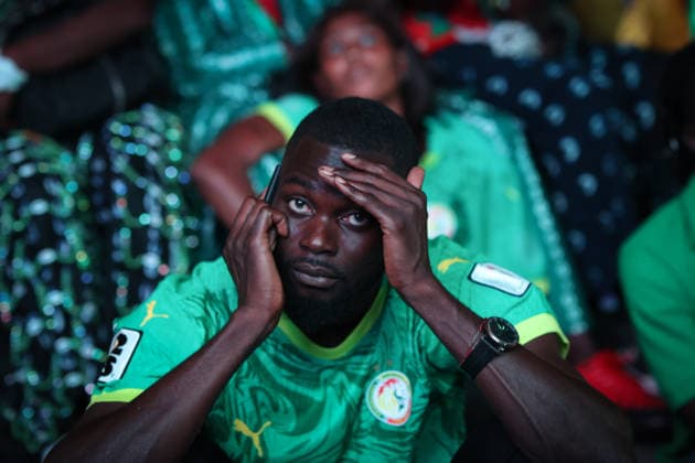 Senegal fans gather to watch World Cup in Dakar DAKAR, SENEGAL- JULY 02: A fan of Senegal upsets after the team s elimination from the 2026 FIFA World Cup, WM, Weltmeisterschaft, Fussball Round of 32 as thousands of fans gathered at Place de la Nation Square to watch the match on a giant screen, holding Senegal flags and wearing national team, Nationalteam jerseys in Dakar, Senegal, on July 02, 2026. Cem Ozdel Anadolu Dakar Senegal. Editorial use only. Please get in touch for any other usage.  Copyright: x2026xAnadoluxCemxOzdelx