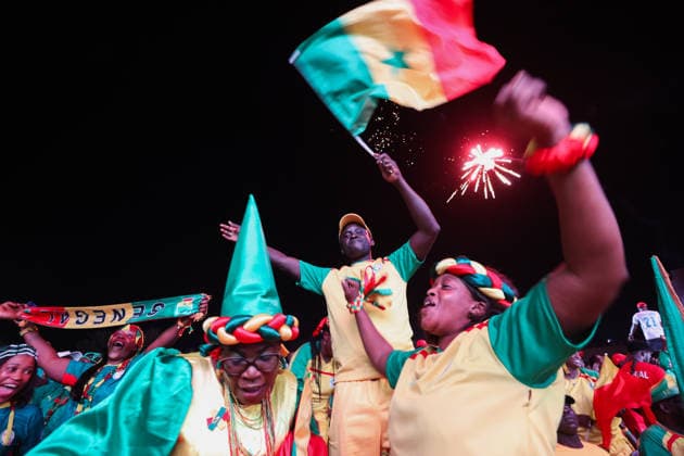 Senegal fans gather to watch World Cup in Dakar DAKAR, SENEGAL- JULY 02: Fans of Senegal cheer after their team scored as thousands of fans gather at Place de la Nation Square to watch the match on a giant screen, holding Senegal flags and wearing national team, Nationalteam jerseys in Dakar, Senegal, on July 02, 2026. Cem Ozdel Anadolu Dakar Senegal. Editorial use only. Please get in touch for any other usage.  Copyright: x2026xAnadoluxCemxOzdelx
