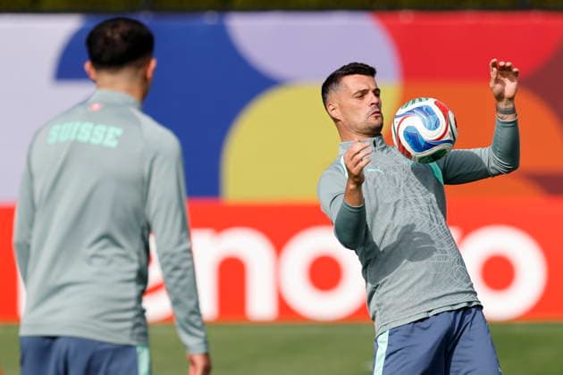 FIFA World Cup, WM, Weltmeisterschaft, Fussball 2026 - Switzerland training session Switzerland s Granit Xhaka (R) watched by teammate Zeki Amdouni during a training session one day ahead of the FIFA World Cup round of 32 match between Switzerland and Algeria at the National Soccer Development Centre in Vancouver, Canada, 01 July 2026. VANCOUVER Canada  Copyright: xPETERxKLAUNZERx