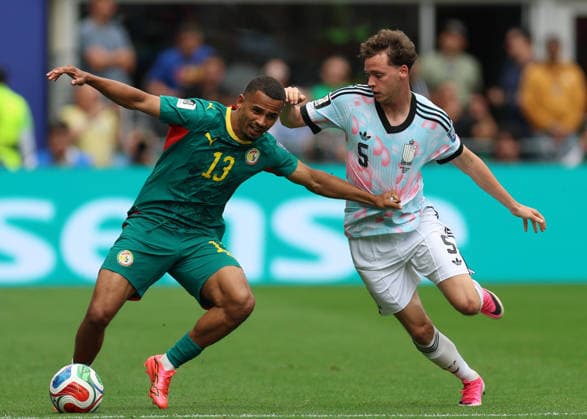(260702) -- SEATTLE, July 2, 2026 -- Iliman Ndiaye (L) of Senegal vies with Maxim De Cuyper of Belgium during the round of 32 match between Belgium and Senegal at the 2026 FIFA World Cup, WM, Weltmeisterschaft, Fussball at Seattle Stadium in Seattle, the United States, July 1, 2026. ) (SP)U.S.-SEATTLE-FOOTBALL-FIFA WORLD CUP-ROUND OF 32-BEL VS SEN MaoxSiqian 