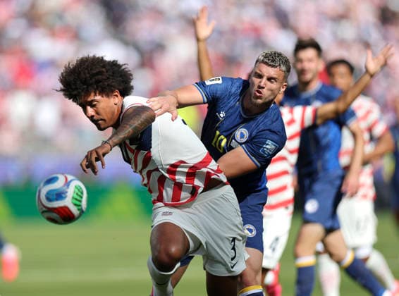 (260702) -- SAN FRANCISCO, July 2, 2026 -- Chris Richards (front, L) of the United States vies with Ermedin Demirovic of Bosnia and Herzegovina during the round of 32 match between the United States and Bosnia and Herzegovina at the 2026 FIFA World Cup, WM, Weltmeisterschaft, Fussball at San Francisco Bay Area Stadium in San Francisco, the United States, July 1, 2026. ) (SP)U.S.-SAN FRANCISCO-FOOTBALL-FIFA WORLD CUP-ROUND OF 32-USA VS BIH CaoxCan 
