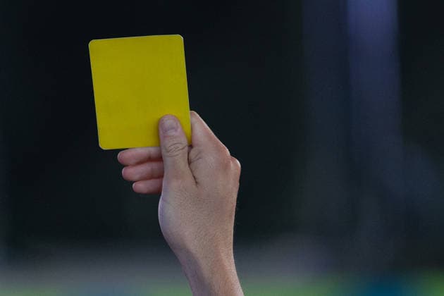 July 1, 2026, Dallas, Texas, USA: A fan pulls out a yellow card at a watch party for a round of 32 game between the United States and Bosnia and Herzegovina at the FIFA Fest in Dallas, Texas. The United States moves on to the round of 16 after defeating Bosnia and Herzegovina, 2-0. World Cup 2026: Watch Party: USA Vs Bosnia And Herzegovina  - ZUMAh193 20260701_zsp_h193_018 Copyright: xDanielxMcGregor-Huyerx