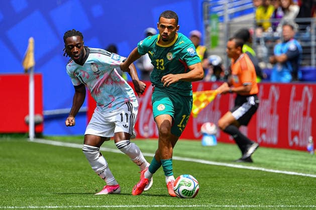 July 01, 2026: Senegal midfielder Iliman Ndiaye (13) moves the ball ahead of Belgium midfielder Jo ro my Doku (11) during the FIFA World Cup, WM, Weltmeisterschaft, Fussball knockout round of 32 match between Belgium and Senegal in Seattle, WA.Belgium defeated Senegal 3-2 on a penalty kick near the end of the second overtime period. CSM FIFA World Cup 2026: JUL 01 Belgium Vs Senegal  - ZUMAc04_ 20260701_zma_c04_067 Copyright: xStevexFaberx