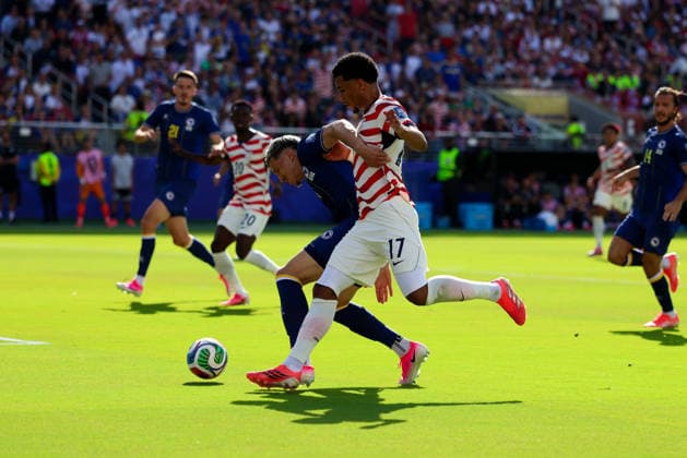 July 1, 2026, Santa Clara, California, USA: Santa Clara, USA - July 1 2026: Malik Tillman of United States runs past Armin GigoviÄ¡ of Bosnia-Herzegovina during a FIFA World Cup, WM, Weltmeisterschaft, Fussball R32 match between United States and Bosnia-Herzegovina at San Francisco Bay Area Stadium World Cup 2026 R32: United States Vs Bosnia-Herzegovina  - ZUMAp121 20260701_zsp_p121_053 Copyright: xChrisxPutnamx