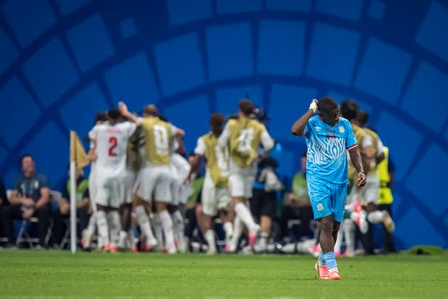 July 1, 2026, Atlanta, Georgia, USA: DR Congo midfielder Noah Sadiki (14) shows his emotions as England forward Harry Kane (9) celebrates after scoring his second goal against DR Congo during their World Cup: Round of 32 match at Atlanta Stadium in ATLANTA, Georgia. England wins the game, 2:1 in regulation play. World Cup: Round Of 32: England Vs DR Congo: Harry Kane  - ZUMAa161 20260701_aaa_a161_480 Copyright: xWalterxArcex xGMGx
