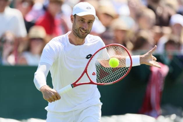 Belgian Sander Gille pictured in action during a first round game between Indian-Brazilian pair Balaji-Demoliner and Belgian-Dutch pair Gille-Verbeek in the Men s doubles at the Wimbledon grand slam tennis tournament in London, Britain, Thursday 02 July 2026. BENOITxDOPPAGNE  x180163087x