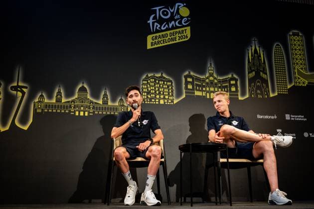 French Valentin Paret-Peintre of Soudal Quick-Step and Belgian Tim Merlier of Soudal Quick-Step pictured during a press conference, PK, Pressekonferenz ahead of the 2026 Tour de France cycling race, Thursday 02 July 2026, in Barcelona, Spain. The 113th edition of the Tour de France starts on Saturday 4 July in Barcelona, Spain, and will finish in Paris, France on the 26th of July. DAVIDxPINTENS  x180177918x
