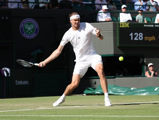 Germany s Alexander Zverev plays a forehand in his match against France s Valentin Royer at Wimbledon on day four of the 2026 Wimbledon Championships in London on Thursday, July 02, 2026. Zverev won the match 6-1,6-3,7-6.  LON2026070261 HUGOxPHILPOTT
