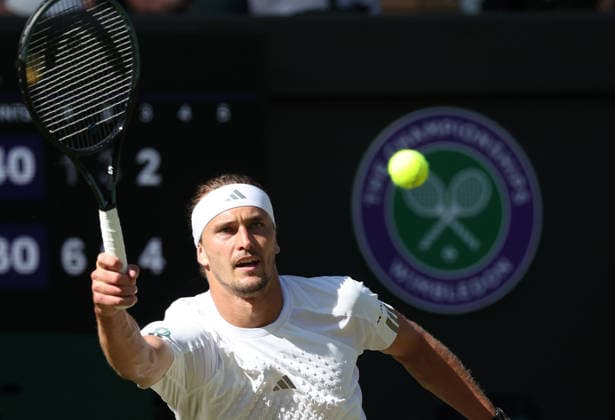 Germany s Alexander Zverev plays a forehand in his match against France s Valentin Royer at Wimbledon on day four of the 2026 Wimbledon Championships in London on Thursday, July 02, 2026. Zverev won the match 6-1,6-3,7-6.  LON2026070271 HUGOxPHILPOTT