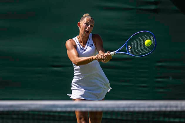 RECORD DATE NOT STATED 2nd July 2026; All England Lawn Tennis and Croquet Club, London, England; Wimbledon Tennis Tournament, Day Four; Alicia Dudeney (GBR) plays a backhand in her first round match with Mimi Xu (GBR) against Su Wei Hseih (TPE) and Xinyu Wang (CHI) GodfreyxPitt