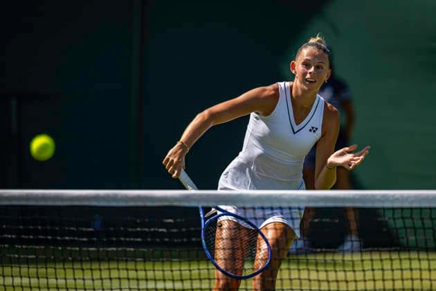 RECORD DATE NOT STATED 2nd July 2026; All England Lawn Tennis and Croquet Club, London, England; Wimbledon Tennis Tournament, Day Four; Alicia Dudeney (GBR) plays a volley in her first round match with Mimi Xu (GBR) against Su Wei Hseih (TPE) and Xinyu Wang (CHI) GodfreyxPitt