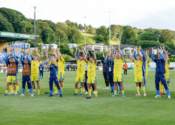 Bangor, Wales, 2nd July 2026. Players and coaches of Ukraine celebrate the full time result following the Serbia U19 vs Ukraine U19 UEFA European U19 Championship match at Bangor City Stadium, Bangor. Picture credit should read: Cody Froggatt Sportimage EDITORIAL USE ONLY. No use with unauthorised audio, video, data, fixture lists, club league logos or live services. Online in-match use limited to 120 images, no video emulation. No use in betting, games or single club league player publications. SPI_022_CF_SERBIA_U19_V_UKRAINE_U19 SPI-4851-0022
