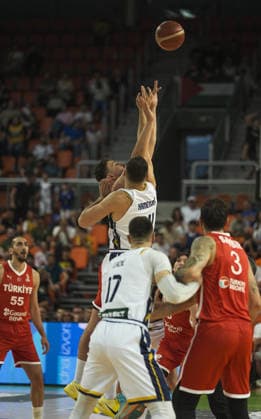 Bosnia and Herzegovina v Turkiye - FIBA Basketball World Cup 2027 European Qualifiers ZENICA, BOSNIA AND HERZEGOVINA - JULY 2: Bosnia and Herzegovina s Miralem Halilovic and a Turkiye player compete for the opening tip as Aleksandar Lazic (17), Kenan Sipahi (55) of Turkiye and Osman Cankaya (3) of Turkiye look on during the FIBA Basketball World Cup 2027 European Qualifiers first-round game at Husejin Smajlovic Hall in Zenica, Bosnia and Herzegovina, on July 2, 2026. Samir Jordamovic Anadolu Zenica Bosnia and Herzegovina. Editorial use only. Please get in touch for any other usage.  Copyright: x2026xAnadoluxSamirxJordamovicx