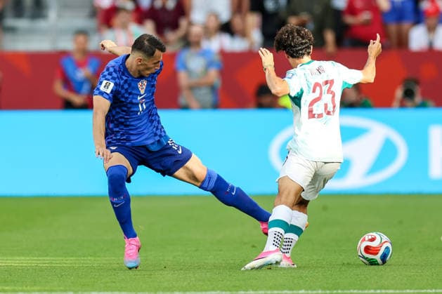 Portugal v Croatia: Round Of 32 - FIFA World Cup, WM, Weltmeisterschaft, Fussball 2026 Ante Budimir of Croatia and Vitinha of Portugal competes for the ball during the FIFA World Cup 2026 Round Of 32 match between Portugal and Croatia at Toronto Stadium on July 2, 2026 in Toronto, Canada.  SanjinxStrukic PIXSELL