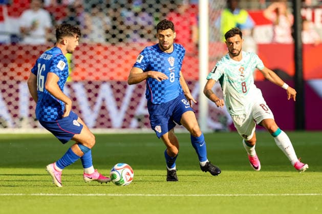Portugal v Croatia: Round Of 32 - FIFA World Cup, WM, Weltmeisterschaft, Fussball 2026 Martin Baturina of Croatia, Mateo Kovacic of Croatia and Bruno Fernandes of Portugal during the FIFA World Cup 2026 Round Of 32 match between Portugal and Croatia at Toronto Stadium on July 2, 2026 in Toronto, Canada.  SanjinxStrukic PIXSELL