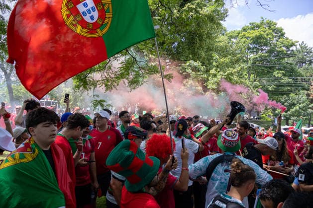 Portuguese fans in Toronto TORONTO, OT - 02.07.2026: PORTUGUESE FANS IN TORONTO - Portuguese fans take to the streets of Toronto in a festive atmosphere ahead of the match between Portugal and Croatia, wearing red and green, carrying flags and celebrating their passion for football. (Photo: R Vasconcelos Fotoarena) x2977475x  RxVasconcelos