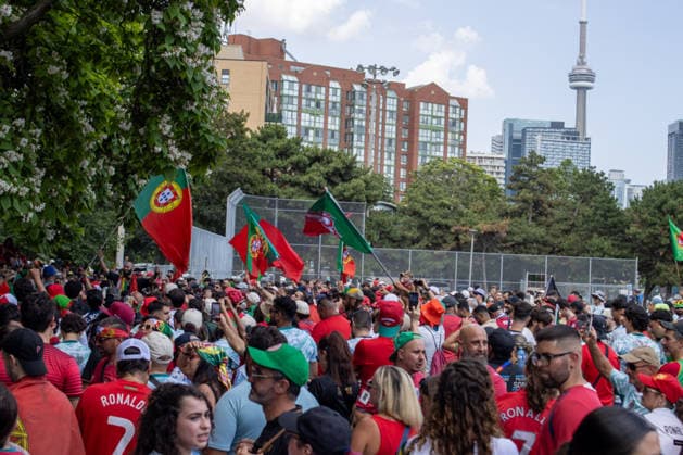 Portuguese fans in Toronto TORONTO, OT - 02.07.2026: PORTUGUESE FANS IN TORONTO - Portuguese fans take to the streets of Toronto in a festive atmosphere ahead of the match between Portugal and Croatia, wearing red and green, carrying flags and celebrating their passion for football. (Photo: R Vasconcelos Fotoarena) x2977485x  RxVasconcelos