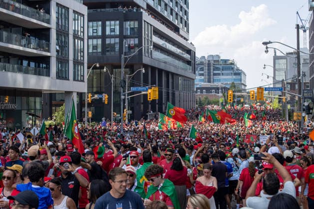 Portuguese fans in Toronto TORONTO, OT - 02.07.2026: PORTUGUESE FANS IN TORONTO - Portuguese fans take to the streets of Toronto in a festive atmosphere ahead of the match between Portugal and Croatia, wearing red and green, carrying flags and celebrating their passion for football. (Photo: R Vasconcelos Fotoarena) x2977532x  RxVasconcelos