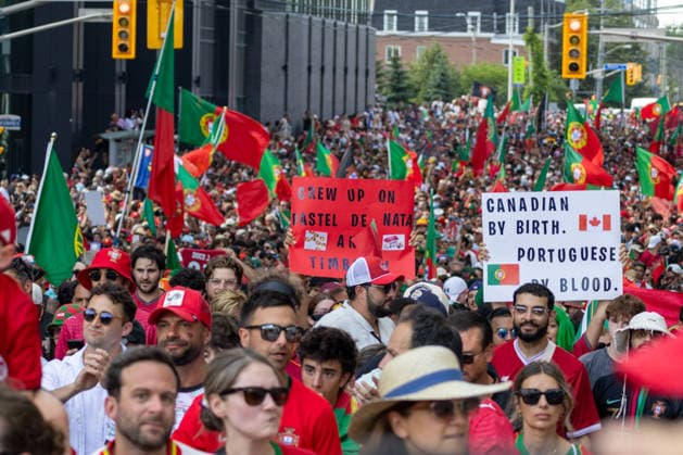 Portuguese fans in Toronto TORONTO, OT - 02.07.2026: PORTUGUESE FANS IN TORONTO - Portuguese fans take to the streets of Toronto in a festive atmosphere ahead of the match between Portugal and Croatia, wearing red and green, carrying flags and celebrating their passion for football. (Photo: R Vasconcelos Fotoarena) x2977527x  RxVasconcelos
