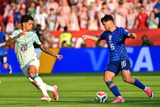 FIFA World Cup, WM, Weltmeisterschaft, Fussball 2026 - Round of 32 - Portugal vs Croatia Joao Cancelo of Portugal (L) in action against Martin Baturina of Croatia (R) during the FIFA World Cup 2026 Round of 32 match Portugal against Croatia, in Toronto, Canada, 02 July 2026. TORONTO Canada  Copyright: xEDUARDOxLIMAx