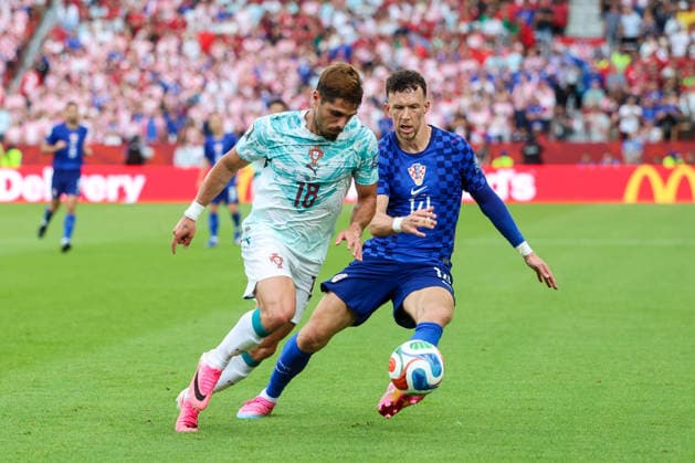 Portugal v Croatia: Round Of 32 - FIFA World Cup, WM, Weltmeisterschaft, Fussball 2026 Pedro Neto of Portugal and Ivan Perisic of Croatia competes for the ball during the FIFA World Cup 2026 Round Of 32 match between Portugal and Croatia at Toronto Stadium on July 2, 2026 in Toronto, Canada.  SanjinxStrukic PIXSELL
