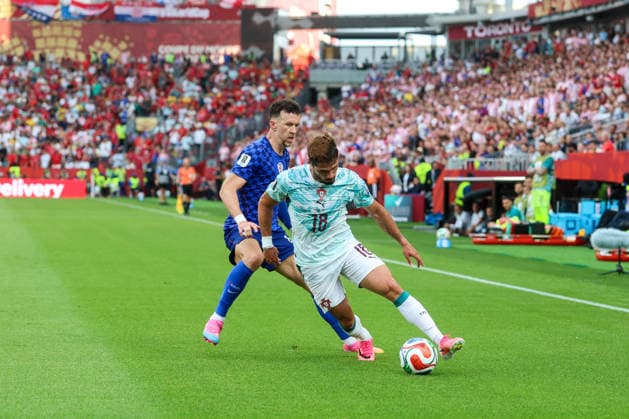 Portugal v Croatia: Round Of 32 - FIFA World Cup, WM, Weltmeisterschaft, Fussball 2026 Pedro Neto of Portugal and Ivan Perisic of Croatia competes for the ball during the FIFA World Cup 2026 Round Of 32 match between Portugal and Croatia at Toronto Stadium on July 2, 2026 in Toronto, Canada.  SanjinxStrukic PIXSELL