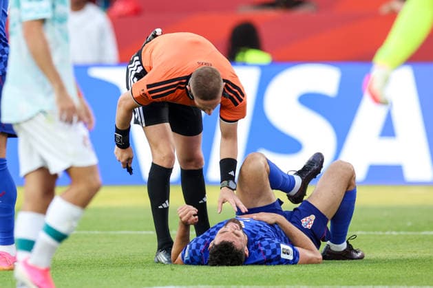 Portugal v Croatia: Round Of 32 - FIFA World Cup, WM, Weltmeisterschaft, Fussball 2026 Referee Espen Eskas and Mateo Kovacic of Croatia during the FIFA World Cup 2026 Round Of 32 match between Portugal and Croatia at Toronto Stadium on July 2, 2026 in Toronto, Canada.  SanjinxStrukic PIXSELL