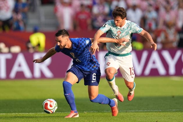 Portugal v Croatia - FIFA World Cup, WM, Weltmeisterschaft, Fussball 2026 - Round of 32 TORONTO, CANADA - JULY 02: Josip Sutalo (6) of Croatia in action against Joao Neves (15) of Portugal during the 2026 FIFA World Cup Round of 32 match between Portugal and Croatia at Toronto Stadium (BMO Field) in Toronto, Ontario, Canada on July 02, 2026. Mert Alper Dervis Anadolu Ontario Canada. Editorial use only. Please get in touch for any other usage.  Copyright: x2026xAnadoluxMertxAlperxDervisx